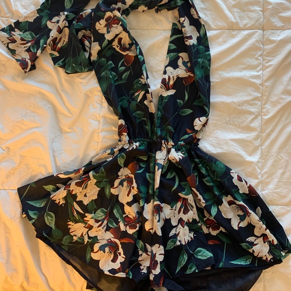 Lulu's Navy Floral Backless Romper with Green Leaves and Cream Blooms